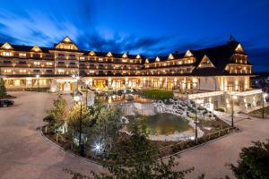 an aerial view of a resort at night at Hotel Bania Thermal & Ski in Białka Tatrzanska
