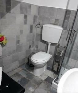 Koupelna v ubytování Alloggio uso turistico