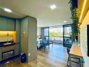 Posezení v ubytování J. Smart Guararapes by Holiday Stays