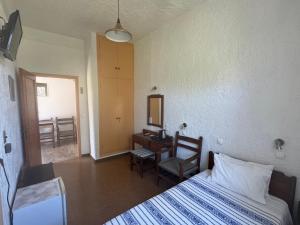 Pythaïs Hotel客房内的一张或多张床位