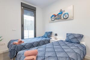 Posteľ alebo postele v izbe v ubytovaní Beachfront Apartment 034