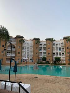 Kolam renang di atau dekat dengan Al kawtar Vacation apartment in Mansouria
