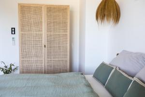 Postel nebo postele na pokoji v ubytování Bretterbude Steiermark