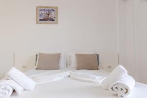 Postel nebo postele na pokoji v ubytování Sunshine Hotel