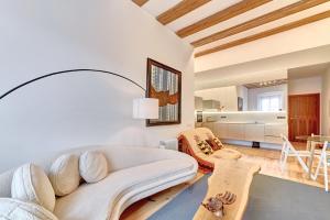 a living room with a couch and a table at Castillo 31 by Clabao in Pamplona