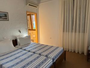 Pythaïs Hotel客房内的一张或多张床位