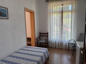 Pythaïs Hotel客房内的一张或多张床位