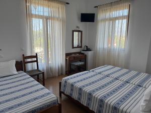 Pythaïs Hotel客房内的一张或多张床位
