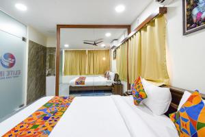 En eller flere senger på et rom på FabHotel Elite Inn- Nr JNTU Metro Station JNTU College