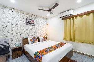 En eller flere senger på et rom på FabHotel Elite Inn- Nr JNTU Metro Station JNTU College