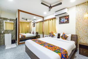 En eller flere senger på et rom på FabHotel Elite Inn- Nr JNTU Metro Station JNTU College