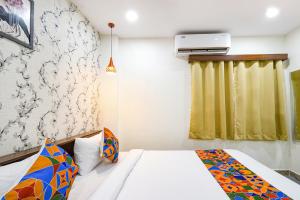 En eller flere senger på et rom på FabHotel Elite Inn- Nr JNTU Metro Station JNTU College