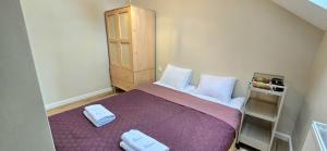 Un pat sau paturi într-o cameră la TriApart Apartamenty Perła Mierzei Sztutowo