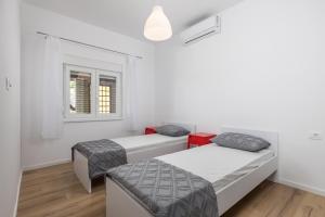 Postel nebo postele na pokoji v ubytování Apartment Div