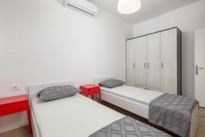 Postel nebo postele na pokoji v ubytování Apartment Div