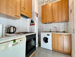 Kuchyň nebo kuchyňský kout v ubytování Spazioso e vicino al mare - Casa MareBlu