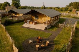 an overhead view of a tent in a field at Dragonfly Riverdale Yorkshire in West Tanfield