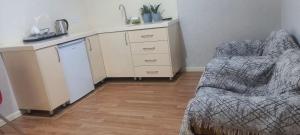 Nhà bếp/bếp nhỏ tại Qusar Apartment