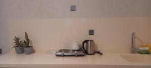 Tiện nghi pha trà/cà phê tại Qusar Apartment