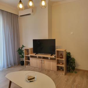 Μια τηλεόραση ή/και κέντρο ψυχαγωγίας στο Comfort apartment