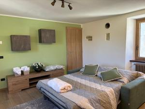Postel nebo postele na pokoji v ubytování Cascina Barbei