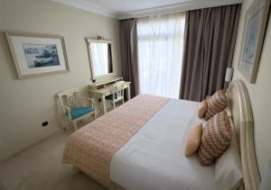 Cama ou camas em um quarto em Holiday Club Playa Amadores
