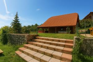 a set of stairs in front of a house at Villa Felix with spectacular pool in green oasis in Opatija