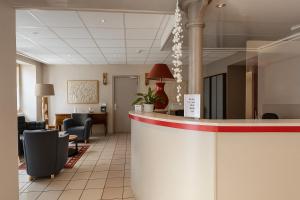 Vstupní hala nebo recepce v ubytování Hôtel de Genève et Restaurant , Faverges-Seythenex