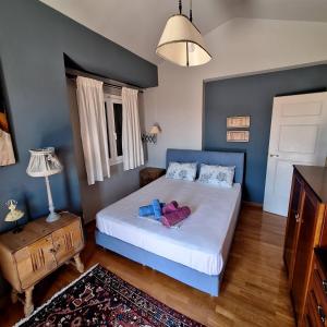 A bed or beds in a room at Villa Pepy