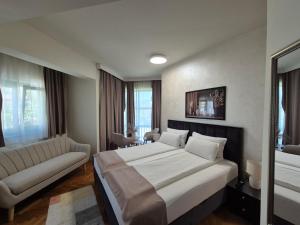 Postel nebo postele na pokoji v ubytování Hotel MB