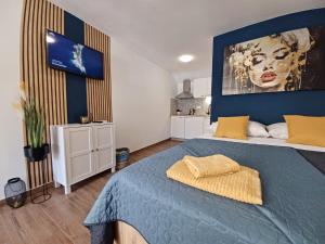 Posteľ alebo postele v izbe v ubytovaní Family apartments Zadar - Ryanair's September