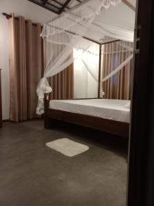 Postel nebo postele na pokoji v ubytování Hemal house