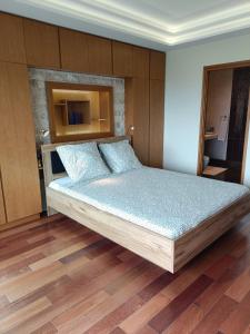 Ένα ή περισσότερα κρεβάτια σε δωμάτιο στο Marina Beach