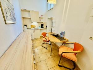Kuchyň nebo kuchyňský kout v ubytování Haus Stromblick, Zimmer am Strom