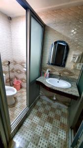 Ванна кімната в Chello Suites