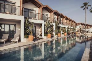 The swimming pool at or close to Day One Beach Resort & SPA - Adult Only