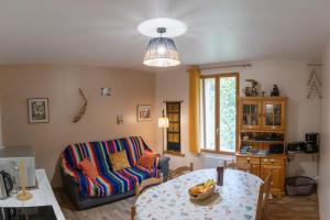 Coin salon dans l'établissement Apt 1er étage - Gite aux 1000 chemins