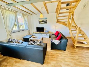 Μια τηλεόραση ή/και κέντρο ψυχαγωγίας στο Ferienhaus Stoertebeker