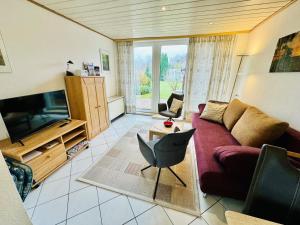 Μια τηλεόραση ή/και κέντρο ψυχαγωγίας στο Ferienhaus Saturn, strandnah