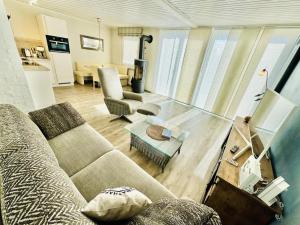 Χώρος καθιστικού στο Ferienhaus Kliff-Haeuschen