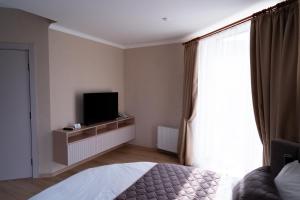 TV a/nebo společenská místnost v ubytování Hotel Palace Ukraine