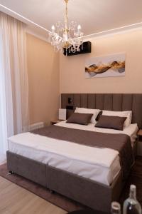 Postel nebo postele na pokoji v ubytování Hotel Palace Ukraine