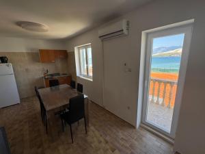 Kuchyň nebo kuchyňský kout v ubytování Apartments Prosika