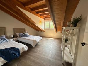 Postel nebo postele na pokoji v ubytování Apartamento Maralta Caravia + 26 fotografií