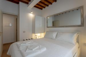 Postel nebo postele na pokoji v ubytování Tuscan Break