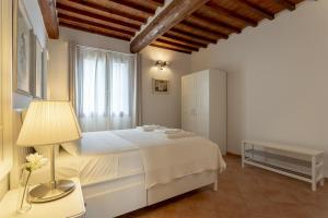 Postel nebo postele na pokoji v ubytování Tuscan Break