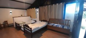 Cama ou camas em um quarto em Pousada Paris Hostelli