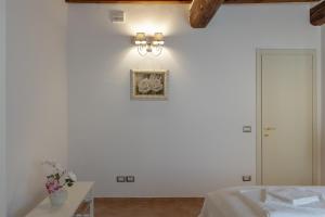 Postel nebo postele na pokoji v ubytování Tuscan Break