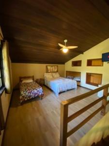 Cama ou camas em um quarto em Pousada Paris Hostelli