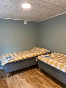 Postel nebo postele na pokoji v ubytování La Casa Klippan